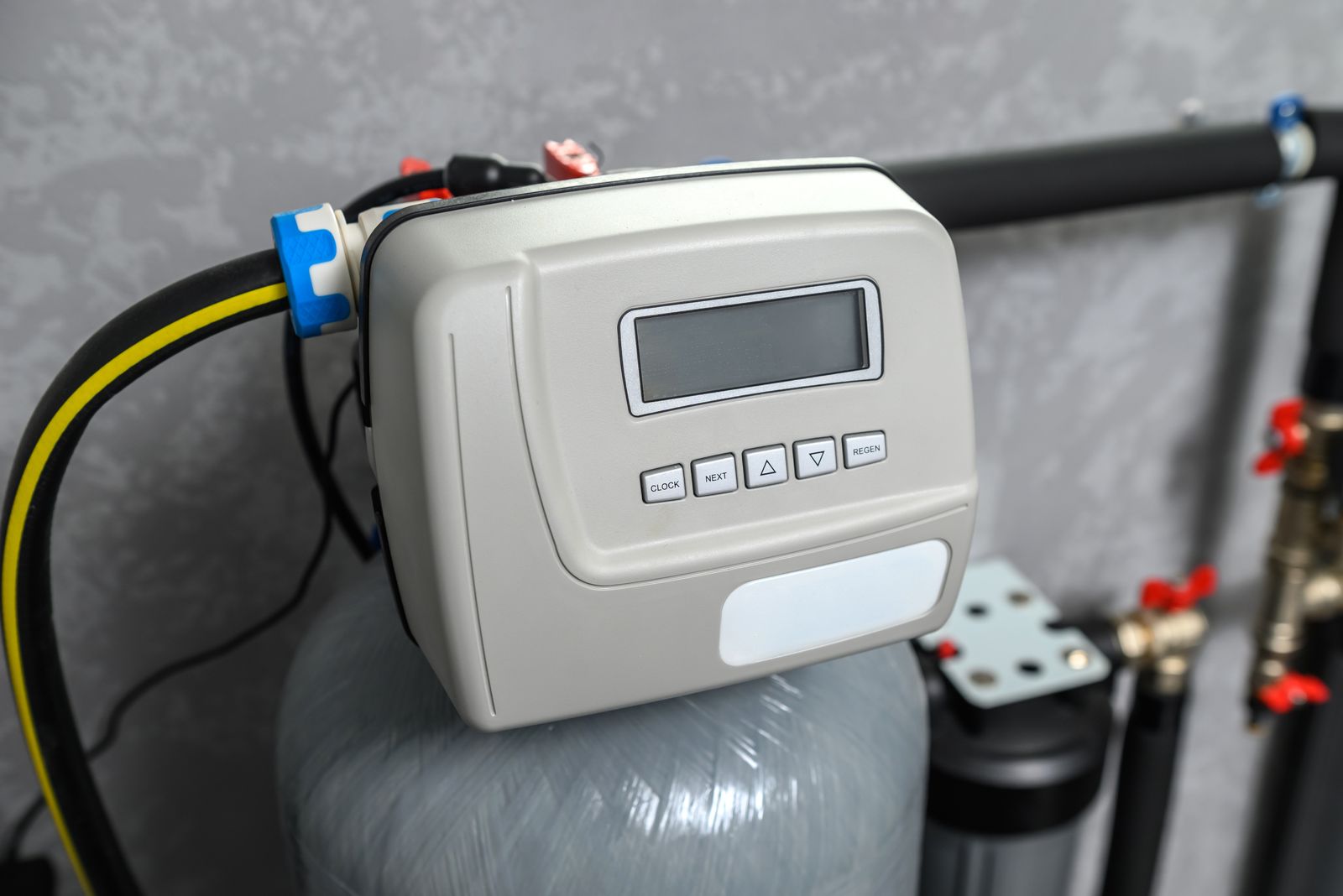 Water softener control panel and system connected to home plumbing, Sunset, UT